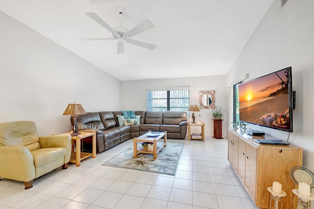 tiled living room with lofted ceiling and ceiling fan