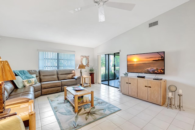 tiled living room with vaulted ceiling and ceiling fan