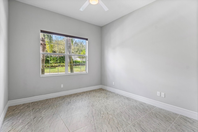 empty room featuring ceiling fan