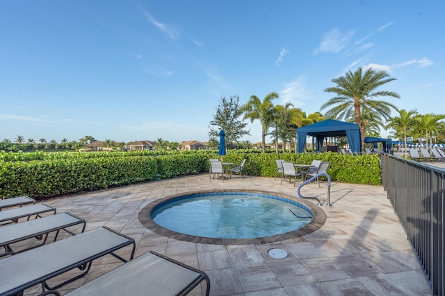 view of pool with a gazebo and a patio area