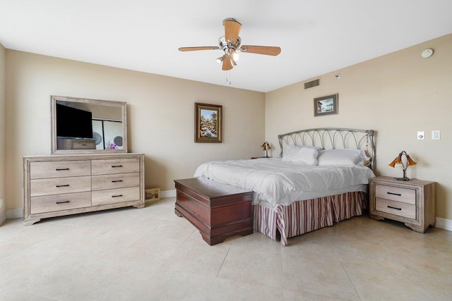 bedroom with light tile patterned floors, baseboards, visible vents, and a ceiling fan