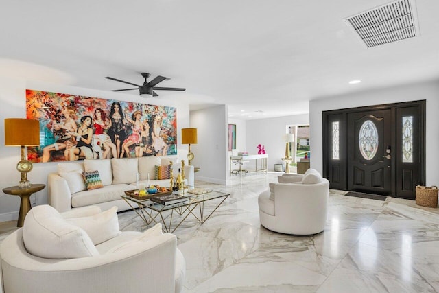 living area featuring baseboards, visible vents, recessed lighting, ceiling fan, and marble finish floor