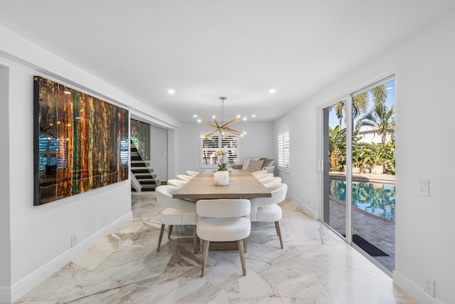 dining room featuring recessed lighting, baseboards, marble finish floor, and a chandelier