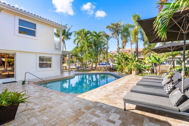 pool with a patio