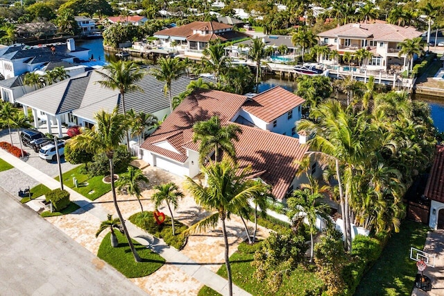 aerial view with a residential view and a water view