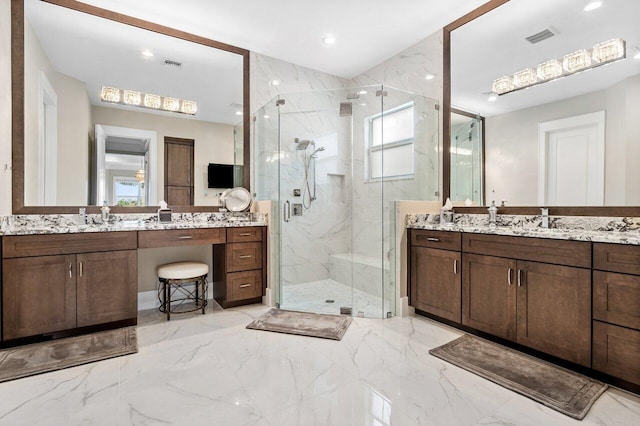 bathroom featuring a marble finish shower, visible vents, and marble finish floor