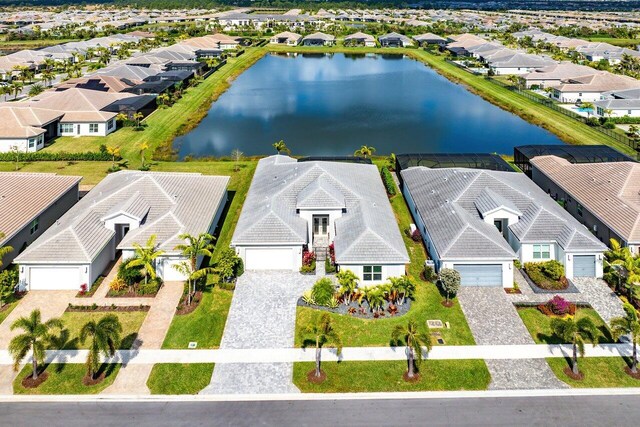 aerial view with a residential view and a water view