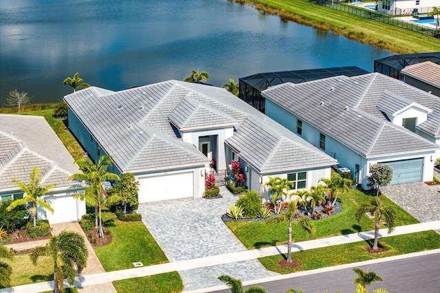 birds eye view of property with a water view