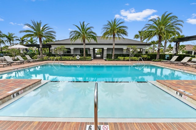 community pool with a patio