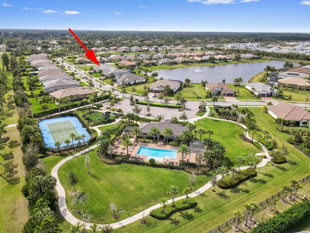 aerial view with a water view and a residential view