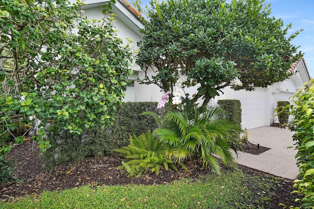 view of yard with a garage