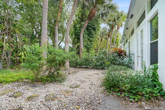 view of yard featuring french doors