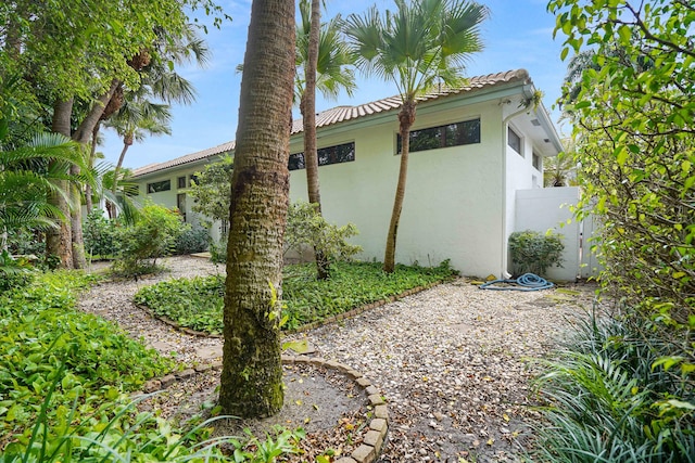 view of property exterior with stucco siding