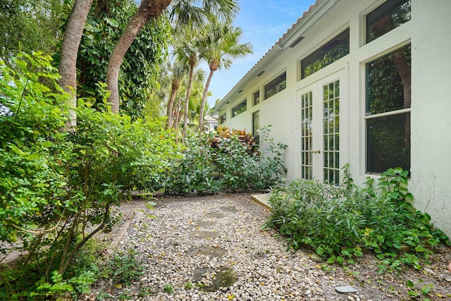 view of yard with french doors