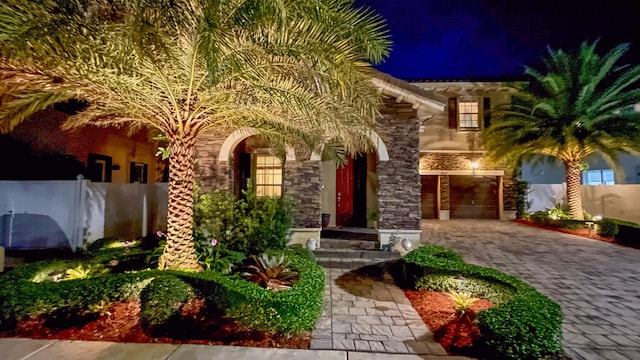 doorway to property featuring a garage