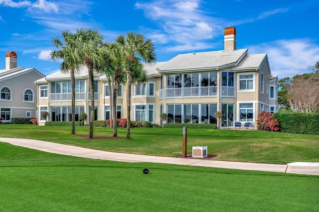 view of community featuring a lawn