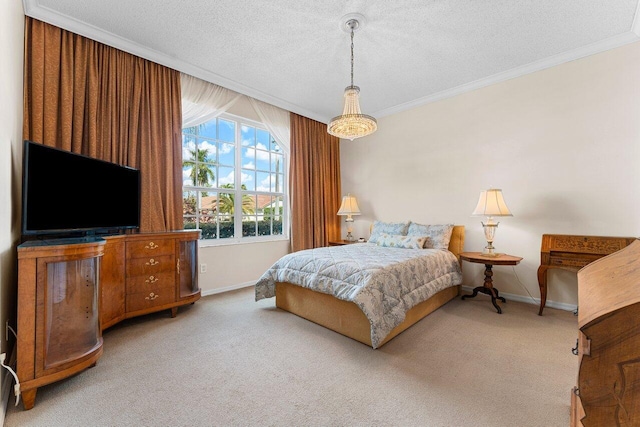 carpeted bedroom featuring crown molding and a textured ceiling