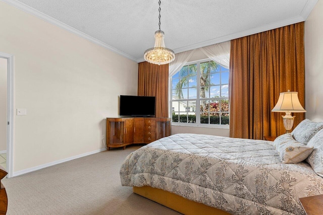 bedroom featuring ornamental molding, carpet, and a textured ceiling