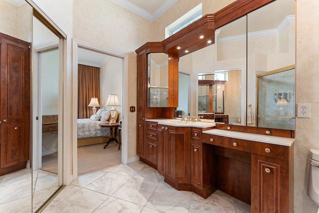 bathroom featuring vanity, ornamental molding, toilet, and a high ceiling