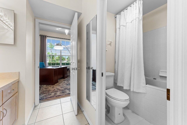 full bathroom with vanity, tile patterned floors, shower / bath combo with shower curtain, and toilet