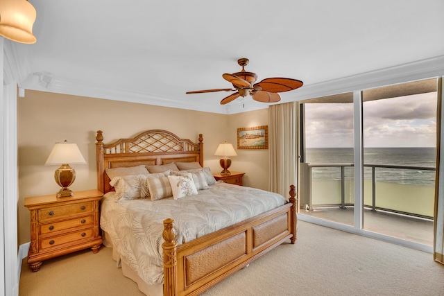 3554 Ocean Dr Unit Ph4S, Vero Beach, FL 32963 - bedroom featuring a water view, ornamental molding, access to outside, and carpet