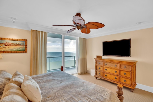 3554 Ocean Dr Unit Ph4S, Vero Beach, FL 32963 - bedroom with access to outside, crown molding, ceiling fan, carpet, and baseboards