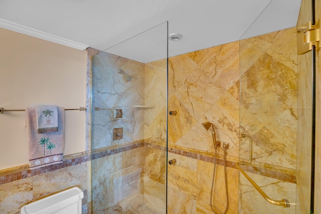 3554 Ocean Dr Unit Ph4S, Vero Beach, FL 32963 - bathroom featuring walk in shower, tile walls, ornamental molding, and toilet