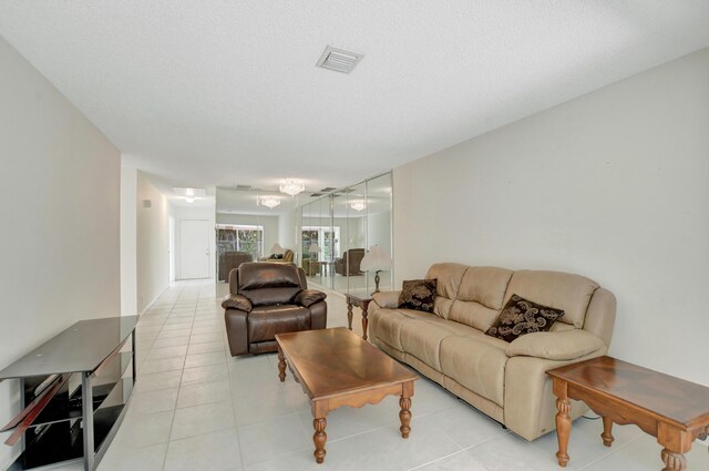 20835 Wendall Ter Unit 68, Boca Raton, FL 33433 - living area with light tile patterned floors