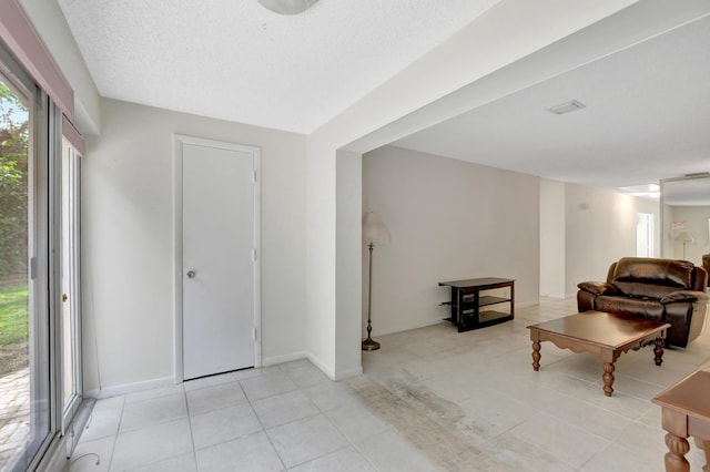 20835 Wendall Ter Unit 68, Boca Raton, FL 33433 - living area featuring light tile patterned floors and baseboards