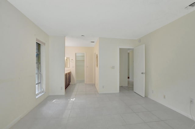 20835 Wendall Ter Unit 68, Boca Raton, FL 33433 - spare room featuring light tile patterned floors and baseboards