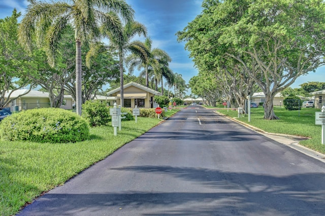 20835 Wendall Ter Unit 68, Boca Raton, FL 33433 - view of asphalt street featuring traffic signs