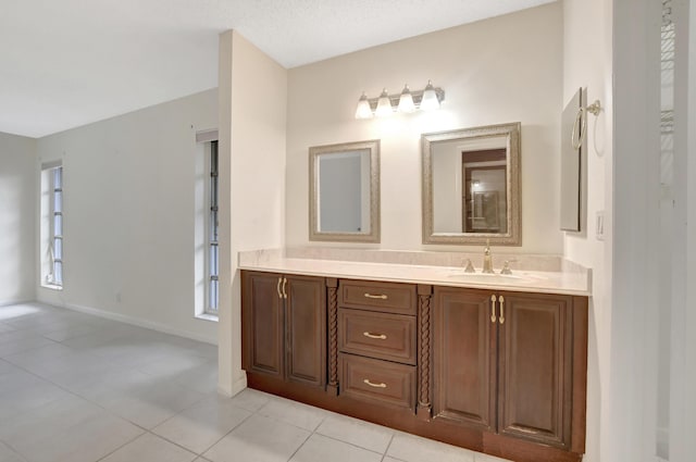 bathroom featuring tile patterned floors and vanity