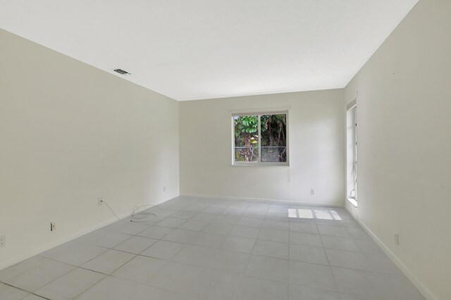 20835 Wendall Ter Unit 68, Boca Raton, FL 33433 - spare room featuring light tile patterned floors and baseboards