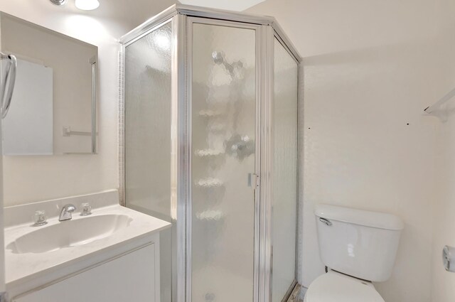 20835 Wendall Ter Unit 68, Boca Raton, FL 33433 - full bathroom with vanity, a stall shower, and toilet