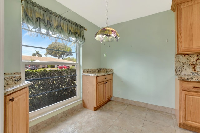 20835 Wendall Ter Unit 68, Boca Raton, FL 33433 - unfurnished dining area featuring vaulted ceiling, light tile patterned floors, and baseboards