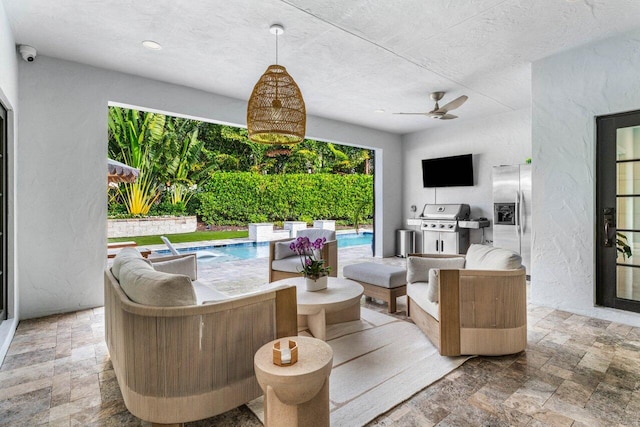 view of patio / terrace featuring an outdoor living space, an outdoor pool, grilling area, and ceiling fan