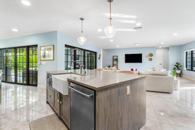 kitchen with a sink, visible vents, marble finish floor, french doors, and dishwasher