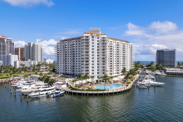 drone / aerial view with a water view and a city view