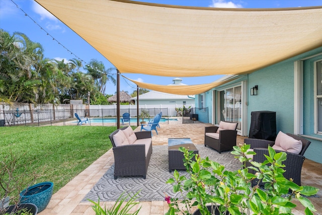 view of patio / terrace featuring an outdoor hangout area and a fenced in pool