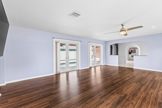 empty room with hardwood / wood-style flooring and ceiling fan