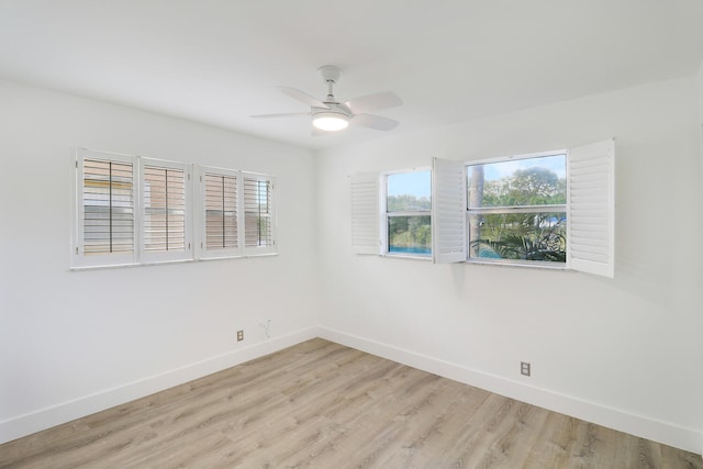 unfurnished room featuring light hardwood / wood-style floors and ceiling fan