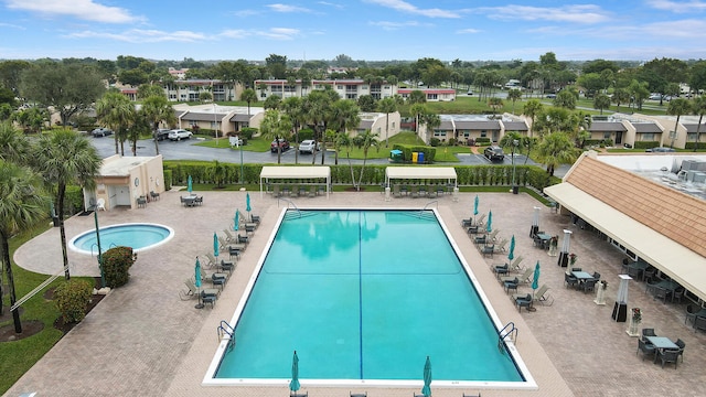 view of pool featuring a patio