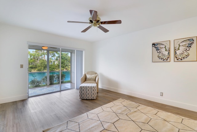 unfurnished room featuring hardwood / wood-style flooring and ceiling fan