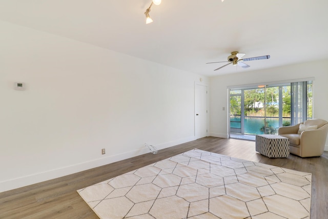 interior space featuring ceiling fan and light hardwood / wood-style flooring