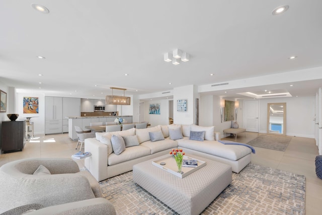 living room featuring light tile patterned floors