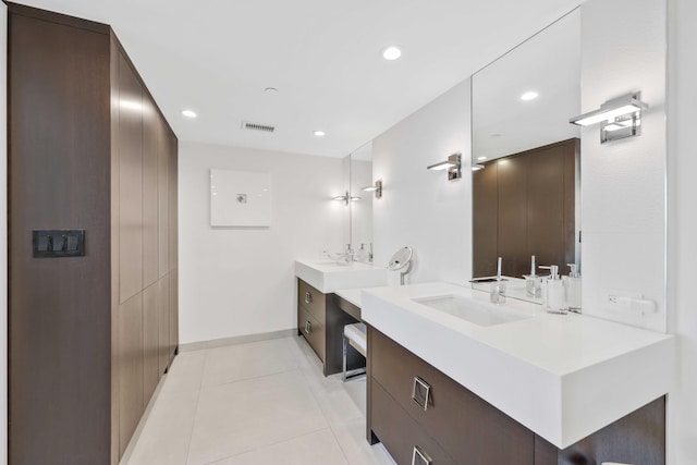 bathroom with vanity and tile patterned floors