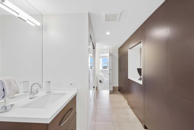 bathroom with vanity and tile patterned floors