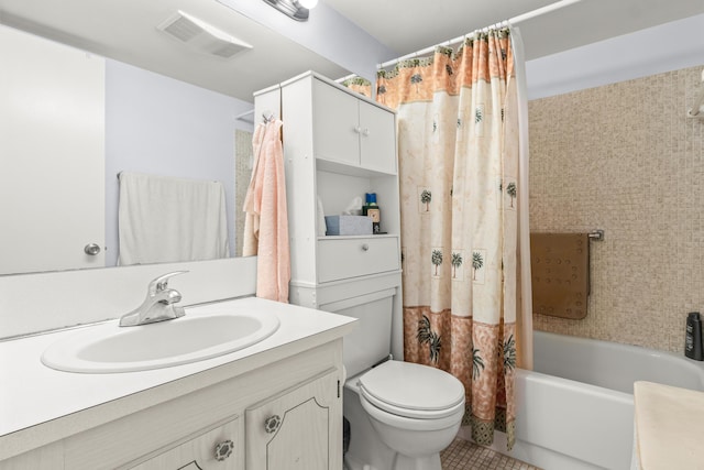 full bathroom featuring vanity, tile patterned flooring, toilet, and shower / tub combo with curtain