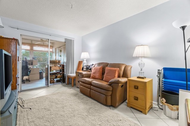 tiled living room with a textured ceiling