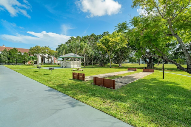 view of community with a yard and a gazebo